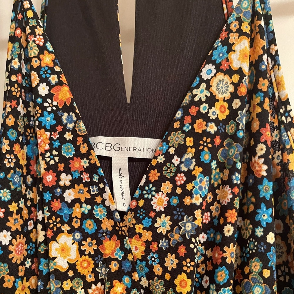 Beautiful floral dress designed with pockets.